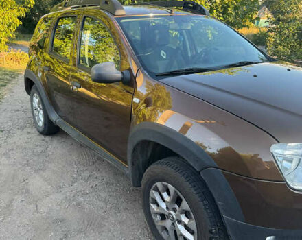 Коричневый Рено Дастер, объемом двигателя 2 л и пробегом 222 тыс. км за 8100 $, фото 2 на Automoto.ua