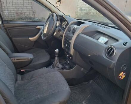 Коричневый Рено Дастер, объемом двигателя 1.45 л и пробегом 142 тыс. км за 10500 $, фото 5 на Automoto.ua