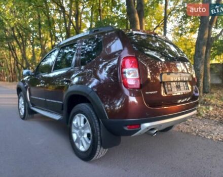 Коричневый Рено Дастер, объемом двигателя 1.6 л и пробегом 87 тыс. км за 15300 $, фото 2 на Automoto.ua