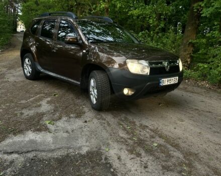 Коричневий Рено Дастер, об'ємом двигуна 1.6 л та пробігом 235 тис. км за 7800 $, фото 1 на Automoto.ua