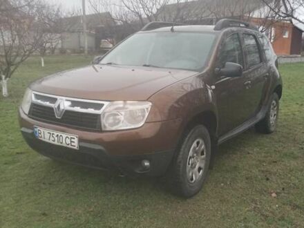 Коричневый Рено Дастер, объемом двигателя 1.6 л и пробегом 230 тыс. км за 7000 $, фото 1 на Automoto.ua