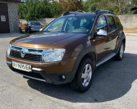 Коричневий Рено Дастер, об'ємом двигуна 1.6 л та пробігом 74 тис. км за 9900 $, фото 1 на Automoto.ua