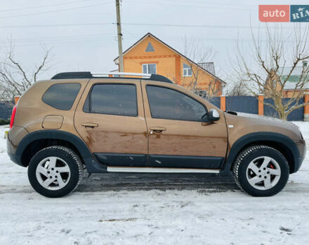 Коричневий Рено Дастер, об'ємом двигуна 1.5 л та пробігом 78 тис. км за 12800 $, фото 1 на Automoto.ua