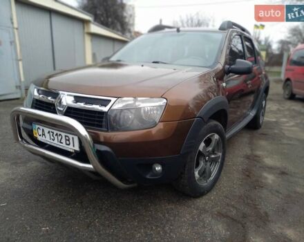 Коричневый Рено Дастер, объемом двигателя 1.46 л и пробегом 188 тыс. км за 9200 $, фото 1 на Automoto.ua