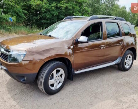 Коричневий Рено Дастер, об'ємом двигуна 1.6 л та пробігом 172 тис. км за 9390 $, фото 1 на Automoto.ua