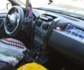 Серый Рено Дастер, объемом двигателя 1.6 л и пробегом 170 тыс. км за 13000 $, фото 2 на Automoto.ua