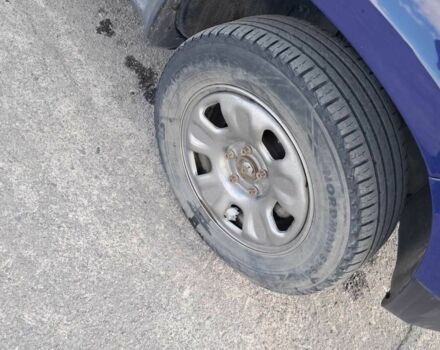 Синий Рено Дастер, объемом двигателя 1.6 л и пробегом 330 тыс. км за 6800 $, фото 3 на Automoto.ua