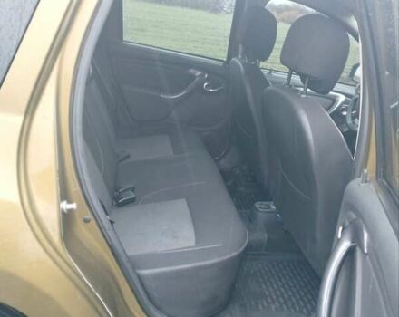 Зеленый Рено Дастер, объемом двигателя 1.46 л и пробегом 212 тыс. км за 9750 $, фото 3 на Automoto.ua