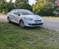 Белый Рено Флюенс, объемом двигателя 2 л и пробегом 170 тыс. км за 5198 $, фото 1 на Automoto.ua