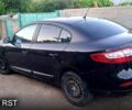 Черный Рено Флюенс, объемом двигателя 1.6 л и пробегом 115 тыс. км за 6200 $, фото 1 на Automoto.ua
