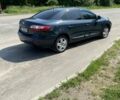 Синий Рено Флюенс, объемом двигателя 2 л и пробегом 321 тыс. км за 7000 $, фото 1 на Automoto.ua