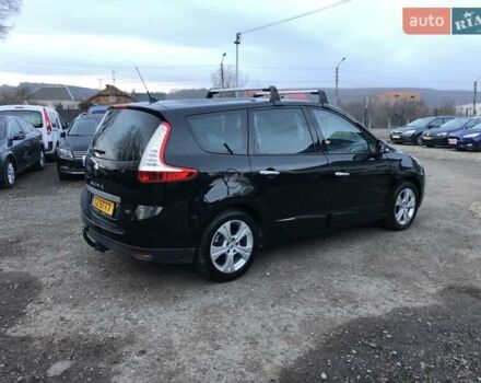 Черный Рено Гранд Сценик, объемом двигателя 1.5 л и пробегом 195 тыс. км за 7800 $, фото 1 на Automoto.ua