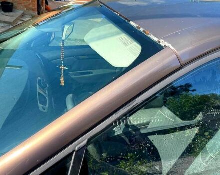 Коричневый Рено Гранд Сценик, объемом двигателя 1.5 л и пробегом 309 тыс. км за 7500 $, фото 1 на Automoto.ua