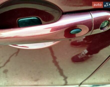 Красный Рено Гранд Сценик, объемом двигателя 1.6 л и пробегом 249 тыс. км за 8500 $, фото 1 на Automoto.ua