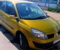 Желтый Рено Гранд Сценик, объемом двигателя 1.9 л и пробегом 226 тыс. км за 6000 $, фото 1 на Automoto.ua
