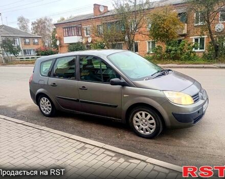 Серый Рено Гранд Сценик, объемом двигателя 1.5 л и пробегом 380 тыс. км за 3650 $, фото 1 на Automoto.ua