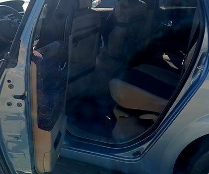 Серый Рено Гранд Сценик, объемом двигателя 2 л и пробегом 295 тыс. км за 5500 $, фото 6 на Automoto.ua