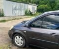 Серый Рено Гранд Сценик, объемом двигателя 2 л и пробегом 237 тыс. км за 5500 $, фото 6 на Automoto.ua