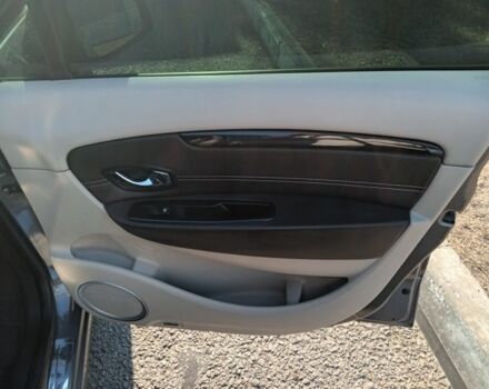 Серый Рено Гранд Сценик, объемом двигателя 1.5 л и пробегом 309 тыс. км за 8750 $, фото 5 на Automoto.ua