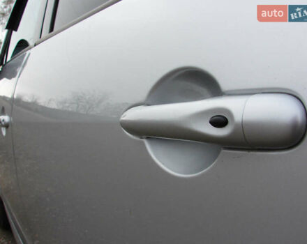 Серый Рено Гранд Сценик, объемом двигателя 1.5 л и пробегом 241 тыс. км за 10000 $, фото 3 на Automoto.ua