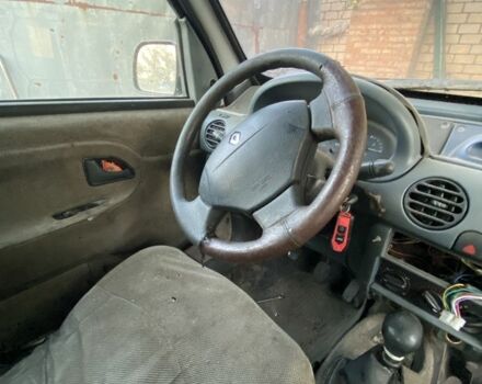 Белый Рено Кенгу, объемом двигателя 1.9 л и пробегом 403 тыс. км за 1430 $, фото 4 на Automoto.ua