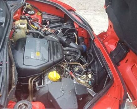 Красный Рено Кенгу, объемом двигателя 1.87 л и пробегом 220 тыс. км за 2600 $, фото 11 на Automoto.ua