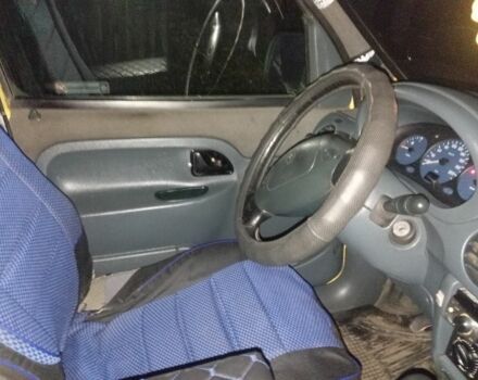 Желтый Рено Кенгу, объемом двигателя 1.2 л и пробегом 250 тыс. км за 2142 $, фото 3 на Automoto.ua