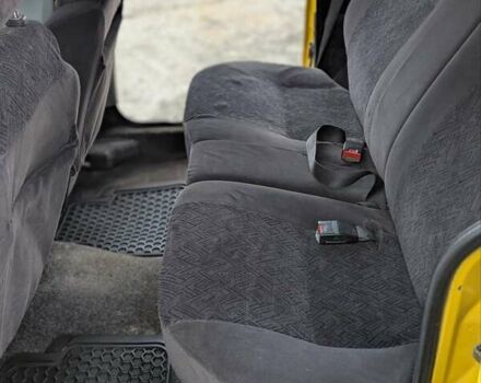 Желтый Рено Кенгу, объемом двигателя 1.46 л и пробегом 250 тыс. км за 2999 $, фото 1 на Automoto.ua