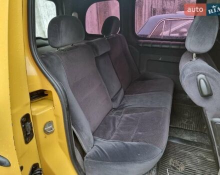 Желтый Рено Кенгу, объемом двигателя 1.46 л и пробегом 313 тыс. км за 4850 $, фото 1 на Automoto.ua