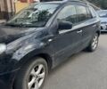 Черный Рено Колеос, объемом двигателя 2.45 л и пробегом 145 тыс. км за 8500 $, фото 1 на Automoto.ua