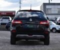 Черный Рено Колеос, объемом двигателя 2.5 л и пробегом 145 тыс. км за 8950 $, фото 3 на Automoto.ua