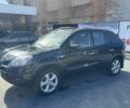 Черный Рено Колеос, объемом двигателя 2.5 л и пробегом 250 тыс. км за 7600 $, фото 1 на Automoto.ua