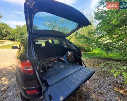 Черный Рено Колеос, объемом двигателя 2 л и пробегом 357 тыс. км за 6000 $, фото 2 на Automoto.ua