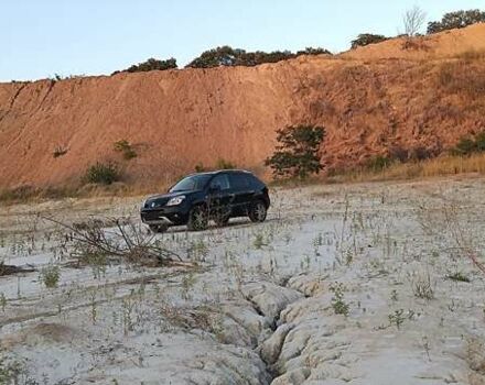 Черный Рено Колеос, объемом двигателя 2 л и пробегом 305 тыс. км за 9600 $, фото 2 на Automoto.ua