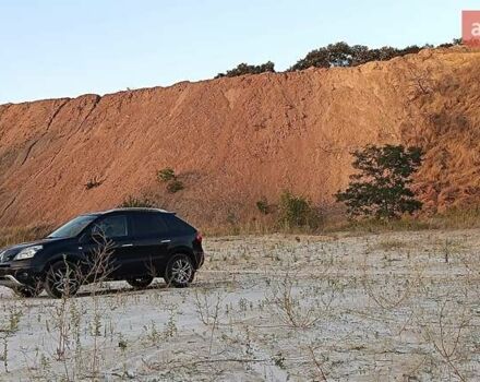 Черный Рено Колеос, объемом двигателя 2 л и пробегом 305 тыс. км за 9600 $, фото 4 на Automoto.ua