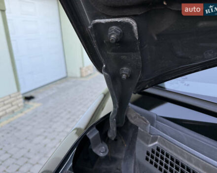 Черный Рено Колеос, объемом двигателя 2.45 л и пробегом 188 тыс. км за 12000 $, фото 102 на Automoto.ua