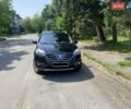 Черный Рено Колеос, объемом двигателя 2.49 л и пробегом 165 тыс. км за 12700 $, фото 1 на Automoto.ua