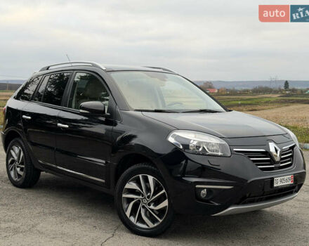 Черный Рено Колеос, объемом двигателя 2.5 л и пробегом 179 тыс. км за 14000 $, фото 1 на Automoto.ua