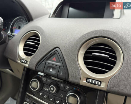 Черный Рено Колеос, объемом двигателя 2.5 л и пробегом 179 тыс. км за 14000 $, фото 48 на Automoto.ua