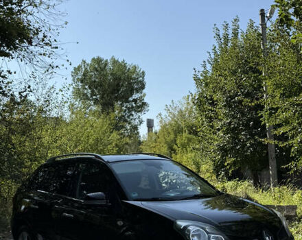 Чорний Рено Колеос, об'ємом двигуна 2 л та пробігом 200 тис. км за 8150 $, фото 1 на Automoto.ua