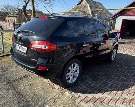 Черный Рено Колеос, объемом двигателя 2.5 л и пробегом 140 тыс. км за 10000 $, фото 1 на Automoto.ua