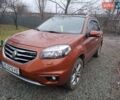 Помаранчевий Рено Колеос, об'ємом двигуна 2 л та пробігом 135 тис. км за 12750 $, фото 1 на Automoto.ua