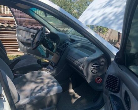Білий Рено Лагуна, об'ємом двигуна 2 л та пробігом 150 тис. км за 2300 $, фото 15 на Automoto.ua