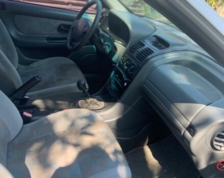 Білий Рено Лагуна, об'ємом двигуна 2 л та пробігом 150 тис. км за 2300 $, фото 11 на Automoto.ua