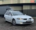 Білий Рено Лагуна, об'ємом двигуна 2 л та пробігом 331 тис. км за 4890 $, фото 1 на Automoto.ua