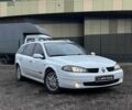 Белый Рено Лагуна, объемом двигателя 2 л и пробегом 311 тыс. км за 6490 $, фото 1 на Automoto.ua