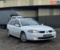 Белый Рено Лагуна, объемом двигателя 2 л и пробегом 311 тыс. км за 6490 $, фото 1 на Automoto.ua