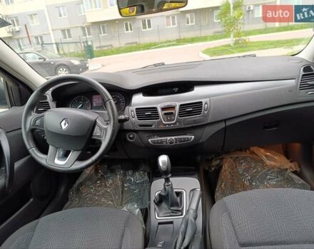 Рено Лагуна 2009 в Харькове на Automoto.ua Белый Рено Лагуна, объемом двигателя 1.46 л и пробегом 197 тыс. км за 5850 $, фото 19 на Automoto.ua