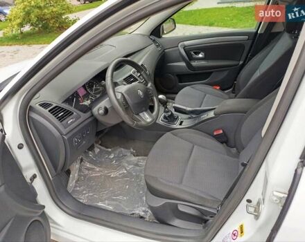 Рено Лагуна 2009 в Харькове на Automoto.ua Белый Рено Лагуна, объемом двигателя 1.46 л и пробегом 197 тыс. км за 5850 $, фото 11 на Automoto.ua