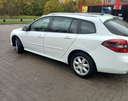 Рено Лагуна 2011 в Хмельницком на Automoto.ua Белый Рено Лагуна, объемом двигателя 2 л и пробегом 274 тыс. км за 6500 $, фото 4 на Automoto.ua